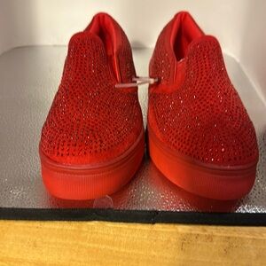 Like new Mudd slip-on sneakers. Size 8. Red with red rhinestones. Worn once.